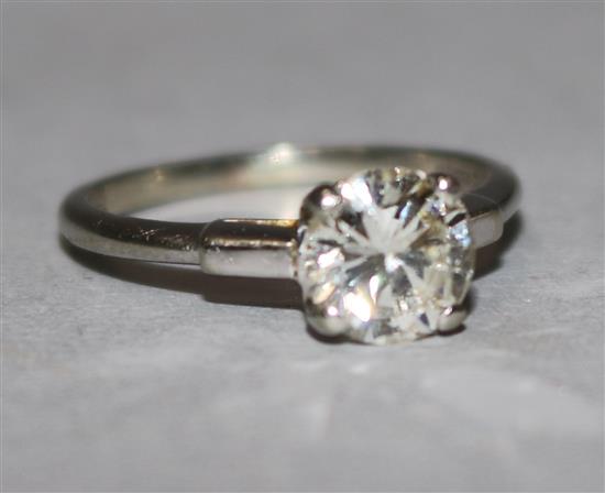 A 14ct white gold and solitaire diamond ring, size L.